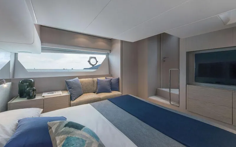  Yacht Photos Pics Luxurious interior of 2025 Ferretti Yachts 500, featuring elegant bedroom with sea view.