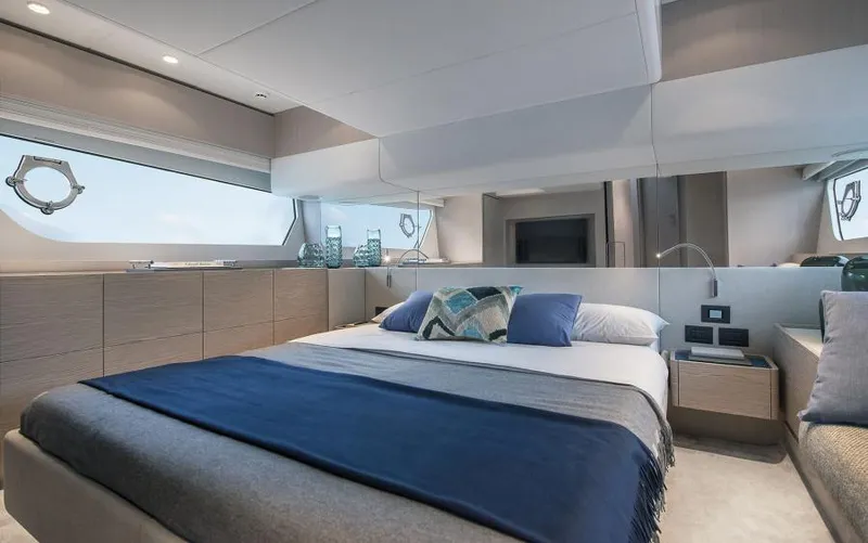  Yacht Photos Pics Luxurious bedroom interior of 2025 Ferretti Yachts 500, featuring modern design and elegant decor.