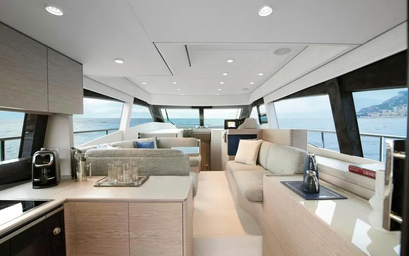  Yacht Photos Pics Luxurious interior of 2025 Ferretti Yachts 500 with modern furnishings and ocean view.