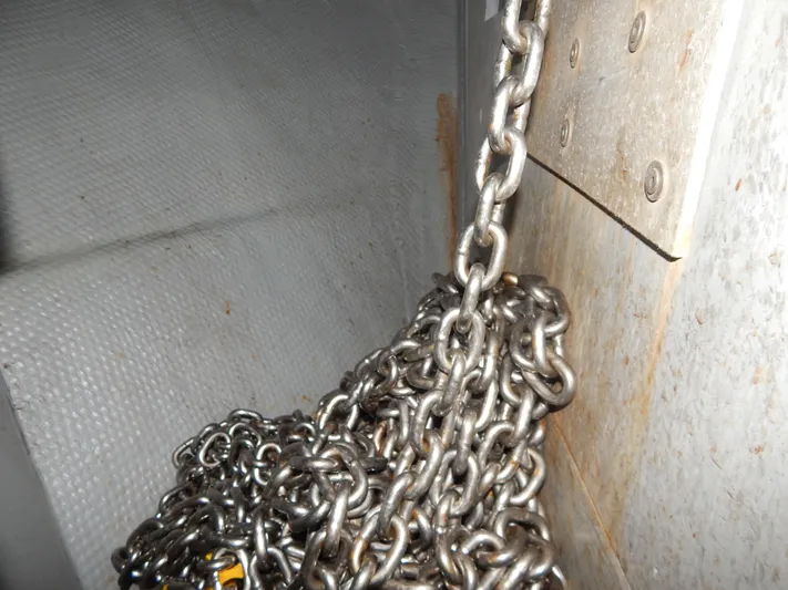  Yacht Photos Pics Anchor chain in a 1981 Hatteras 50 Convertible boat compartment.