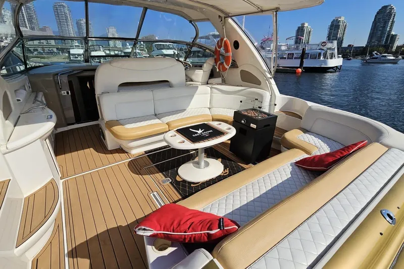  Yacht Photos Pics Luxurious 1999 Sea Ray 460 Sundancer yacht interior with elegant seating and waterfront view.