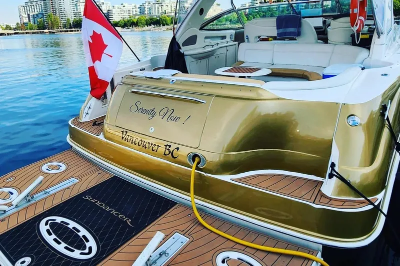  Yacht Photos Pics 1999 Sea Ray 460 Sundancer yacht docked in Vancouver, BC, with Canadian flag.