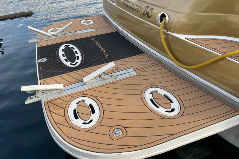  Yacht Photos Pics 1999 Sea Ray 460 Sundancer swim platform with teak design, docked in Vancouver, BC.