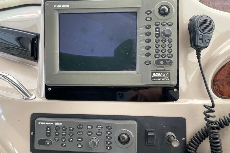  Yacht Photos Pics Furuno navigation system on 1999 Sea Ray 460 Sundancer boat dashboard.