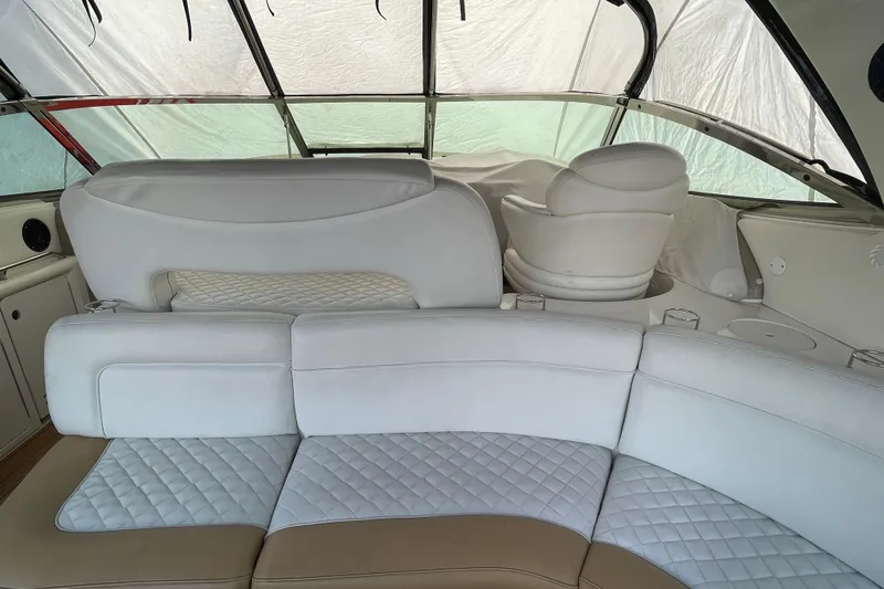  Yacht Photos Pics Luxurious interior of a 1999 Sea Ray 460 Sundancer yacht with white leather seating.