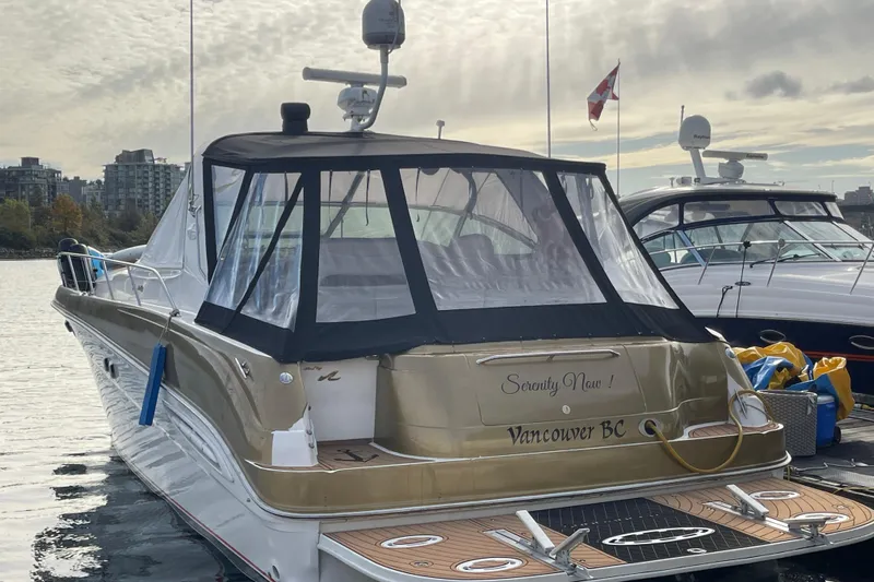  Yacht Photos Pics 1999 Sea Ray 460 Sundancer yacht docked in Vancouver, BC, with covered deck.