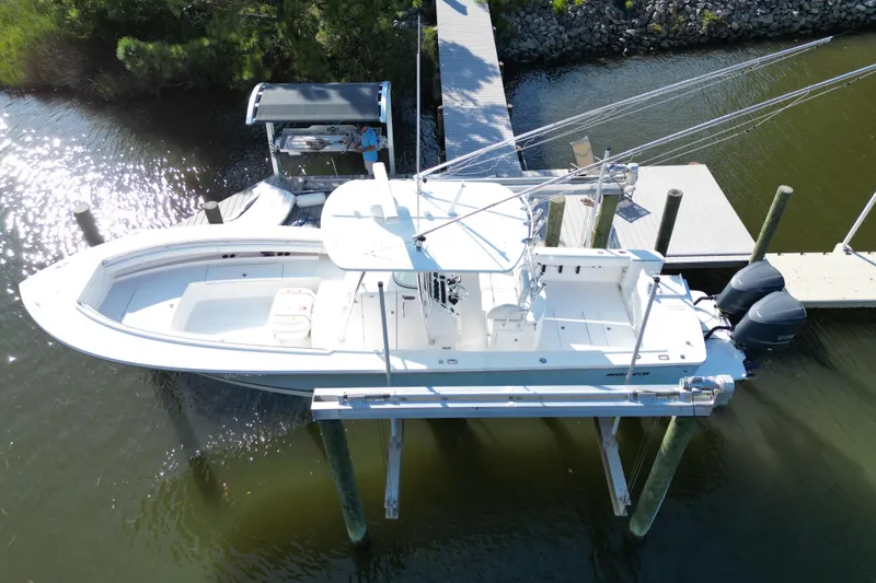 Yacht Photos Pics Aerial view of 2009 Regulator 34SS boat docked with dual engines.