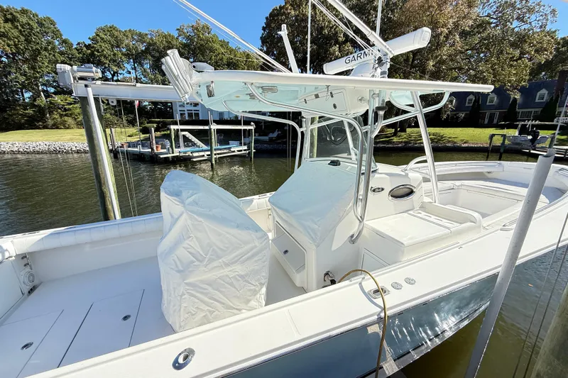  Yacht Photos Pics 2009 Regulator 34SS boat docked, featuring a sleek design and modern equipment.