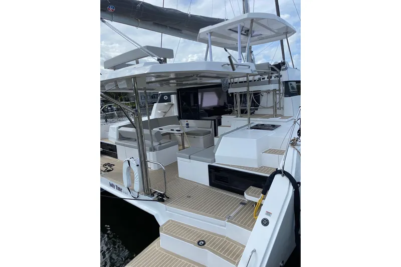 Jolly Time Yacht Photos Pics 2021 Leopard 42 catamaran with spacious deck and modern seating area.