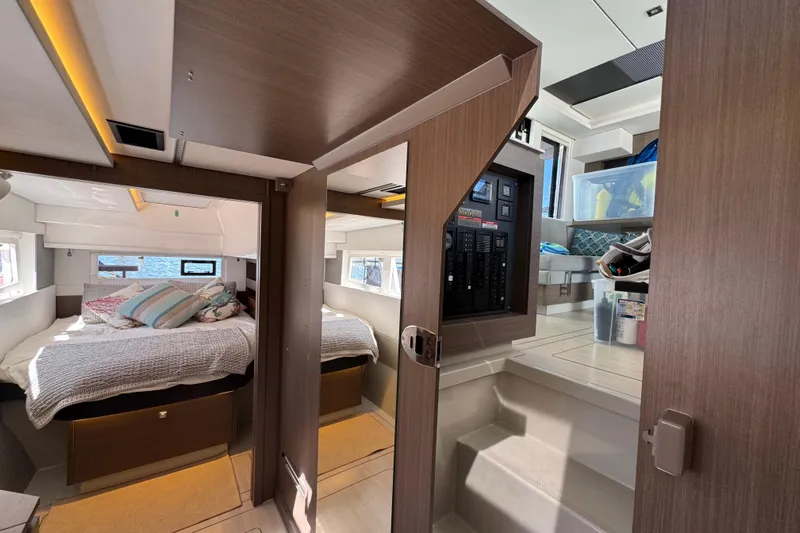 Jolly Time Yacht Photos Pics Interior of 2021 Leopard 42 catamaran featuring cozy bedroom and modern living area.