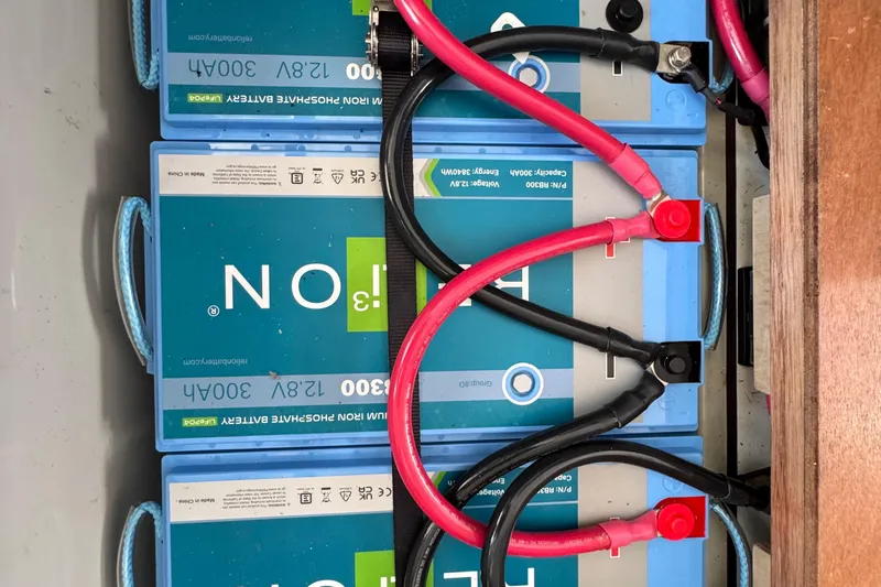 Jolly Time Yacht Photos Pics Lithium iron phosphate batteries in Leopard 42, 2021 model, with red and black cables.