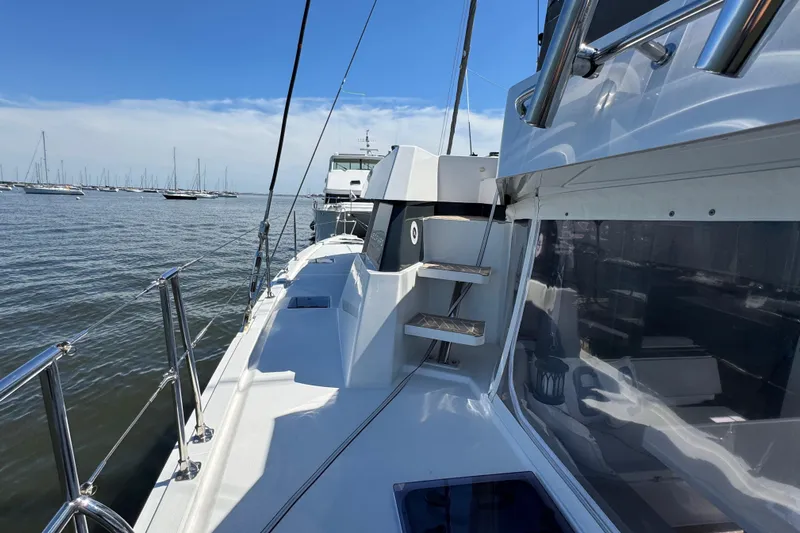 Jolly Time Yacht Photos Pics 2021 Leopard 42 yacht deck with ocean view and clear blue sky.