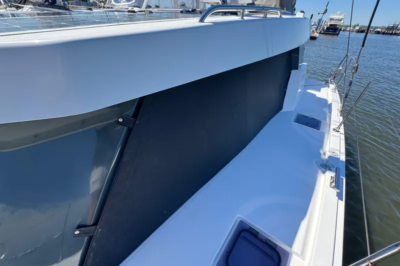 Jolly Time Yacht Photos Pics 2021 Leopard 42 yacht deck with sleek design and modern features, docked at marina.