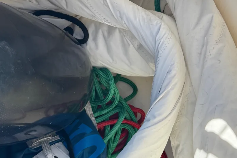 Jolly Time Yacht Photos Pics Coiled ropes and sail on Leopard 42, 2021 model, in a storage compartment.
