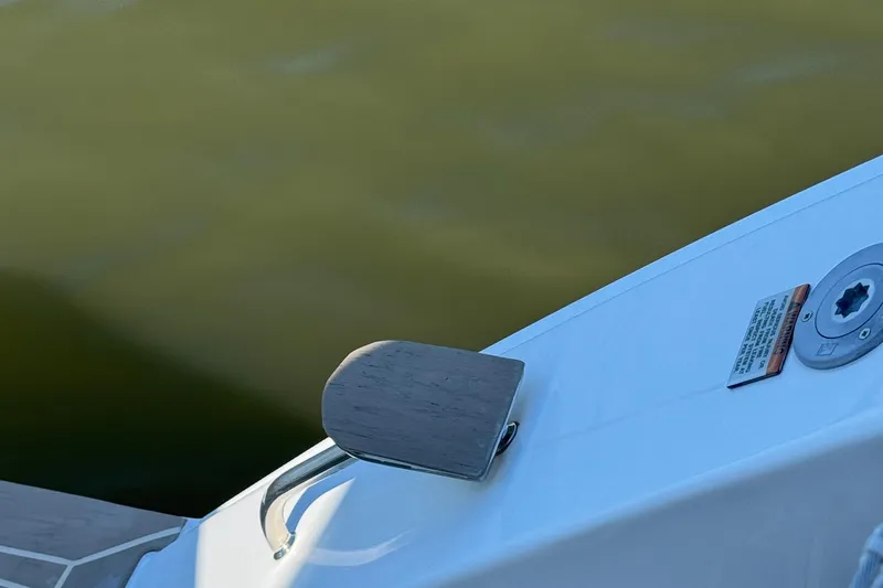 Jolly Time Yacht Photos Pics Close-up of a 2021 Leopard 42 boat deck with water in the background.