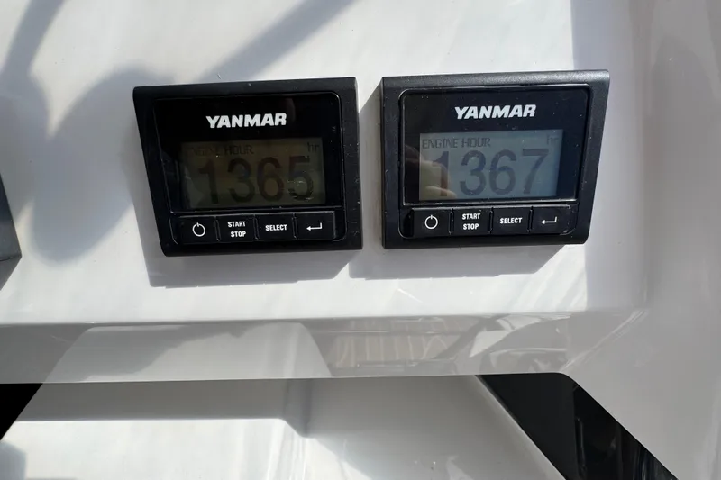 Jolly Time Yacht Photos Pics Yanmar engine hour meters on a 2021 Leopard 42 catamaran, displaying 1365 and 1367 hours.