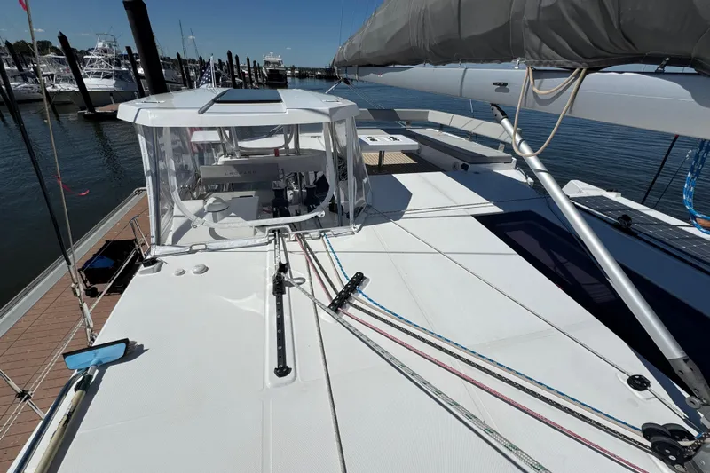 Jolly Time Yacht Photos Pics Sleek 2021 Leopard 42 catamaran docked, showcasing modern deck design and rigging.