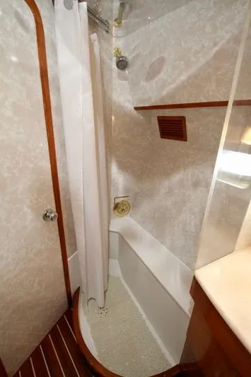  Yacht Photos Pics Compact bathroom with shower in 1999 Prima 5230 model.