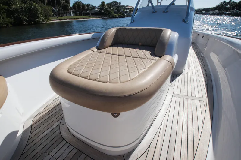 Yacht Photos Pics 2018 Winter Custom Yachts Center Console with cushioned seating on deck.