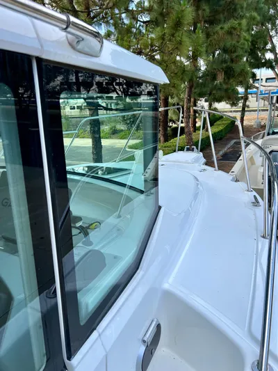  Yacht Photos Pics 2023 NJM NSB-28 boat with sleek design, large windows, and outdoor view.