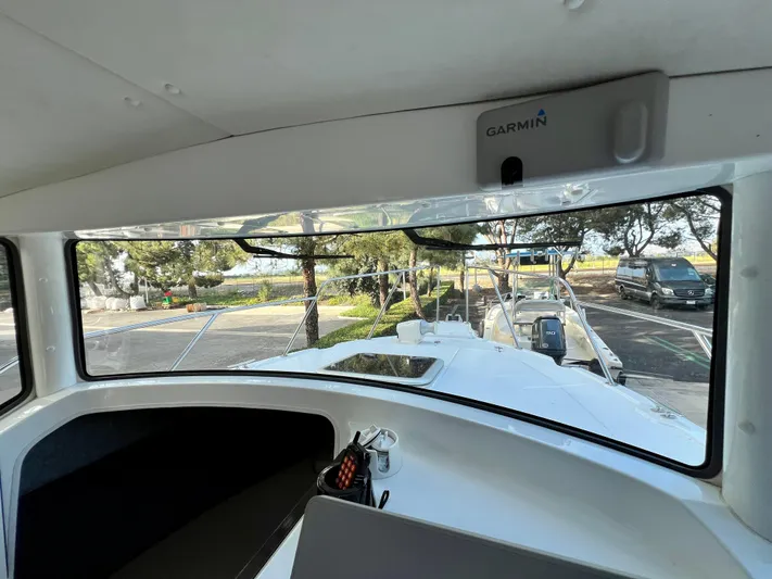  Yacht Photos Pics Interior view of NJM NSB-28 boat, 2023 model, featuring Garmin equipment.