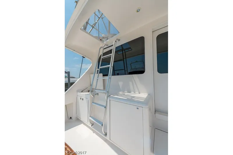 No Pressure Yacht Photos Pics 2007 Post 53 Convertible yacht with ladder and sleek white exterior.