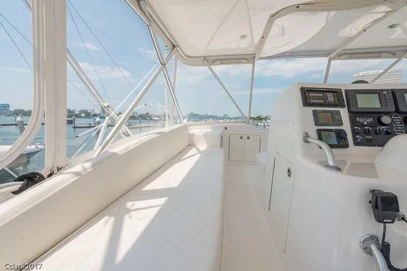 No Pressure Yacht Photos Pics Luxurious 2007 Post 53 Convertible yacht interior with navigation controls and waterfront view.