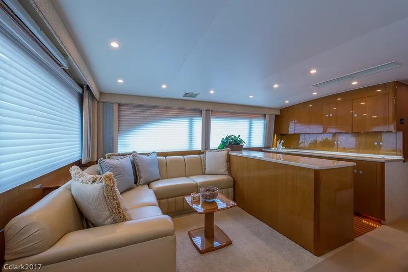 No Pressure Yacht Photos Pics Luxurious interior of a 2007 Post 53 Convertible yacht with plush seating and elegant decor.