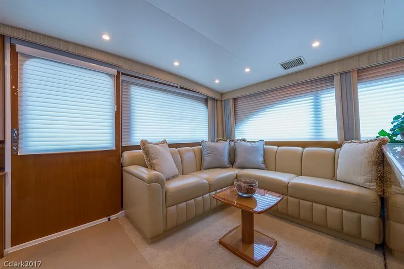 No Pressure Yacht Photos Pics Luxurious interior of 2007 Post 53 Convertible yacht with plush seating and elegant decor.