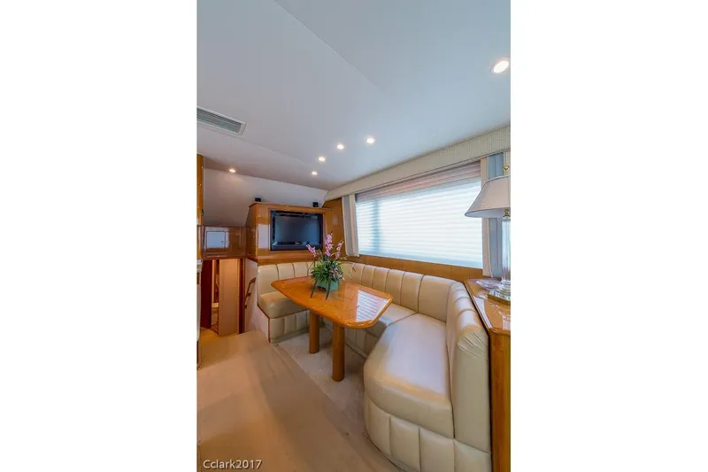No Pressure Yacht Photos Pics Luxurious interior of 2007 Post 53 Convertible yacht with cozy seating and elegant decor.