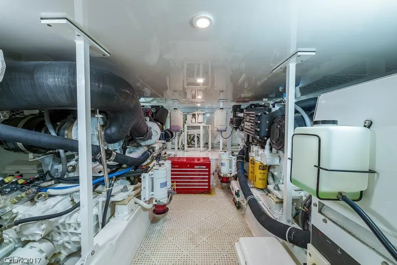 No Pressure Yacht Photos Pics Engine room of 2007 Post 53 Convertible yacht, featuring mechanical components and storage.