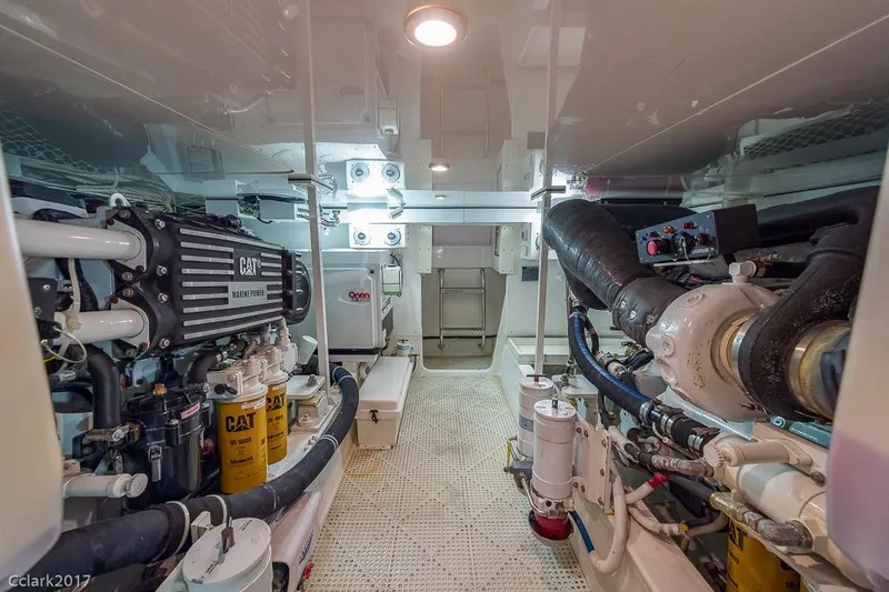 No Pressure Yacht Photos Pics Engine room of a 2007 Post 53 Convertible yacht, featuring CAT marine power systems.