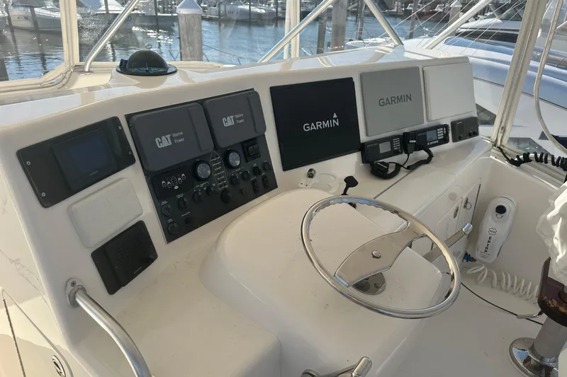 No Pressure Yacht Photos Pics Helm of 2007 Post 53 Convertible with Garmin navigation and CAT Marine Power controls.