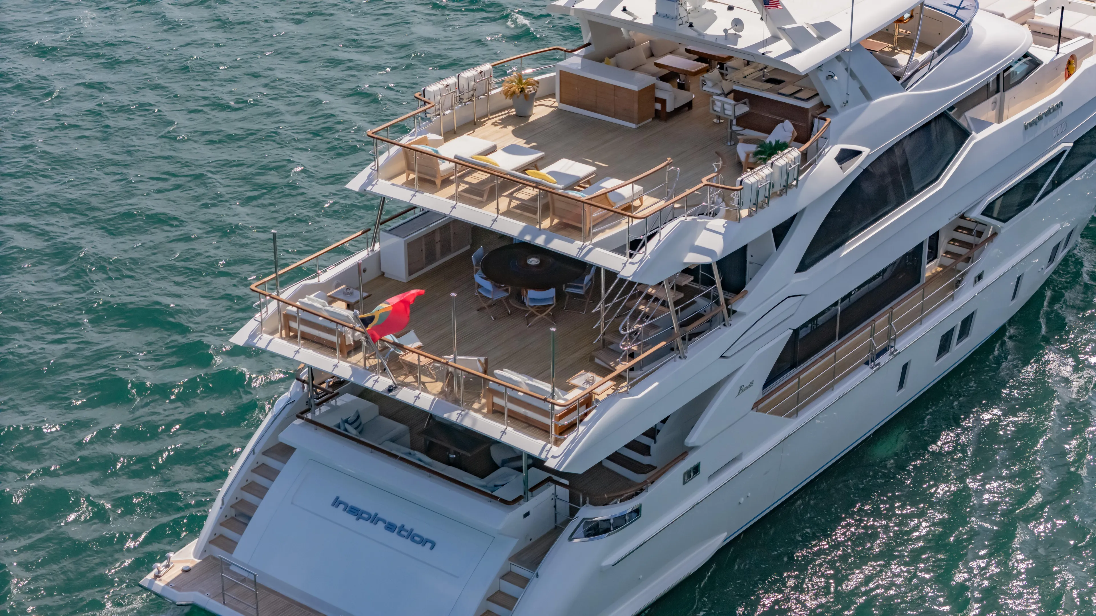 Inspiration Yacht Photos Pics Luxurious 2018 Benetti Fast 125 yacht cruising on open water, showcasing elegant multi-level decks.