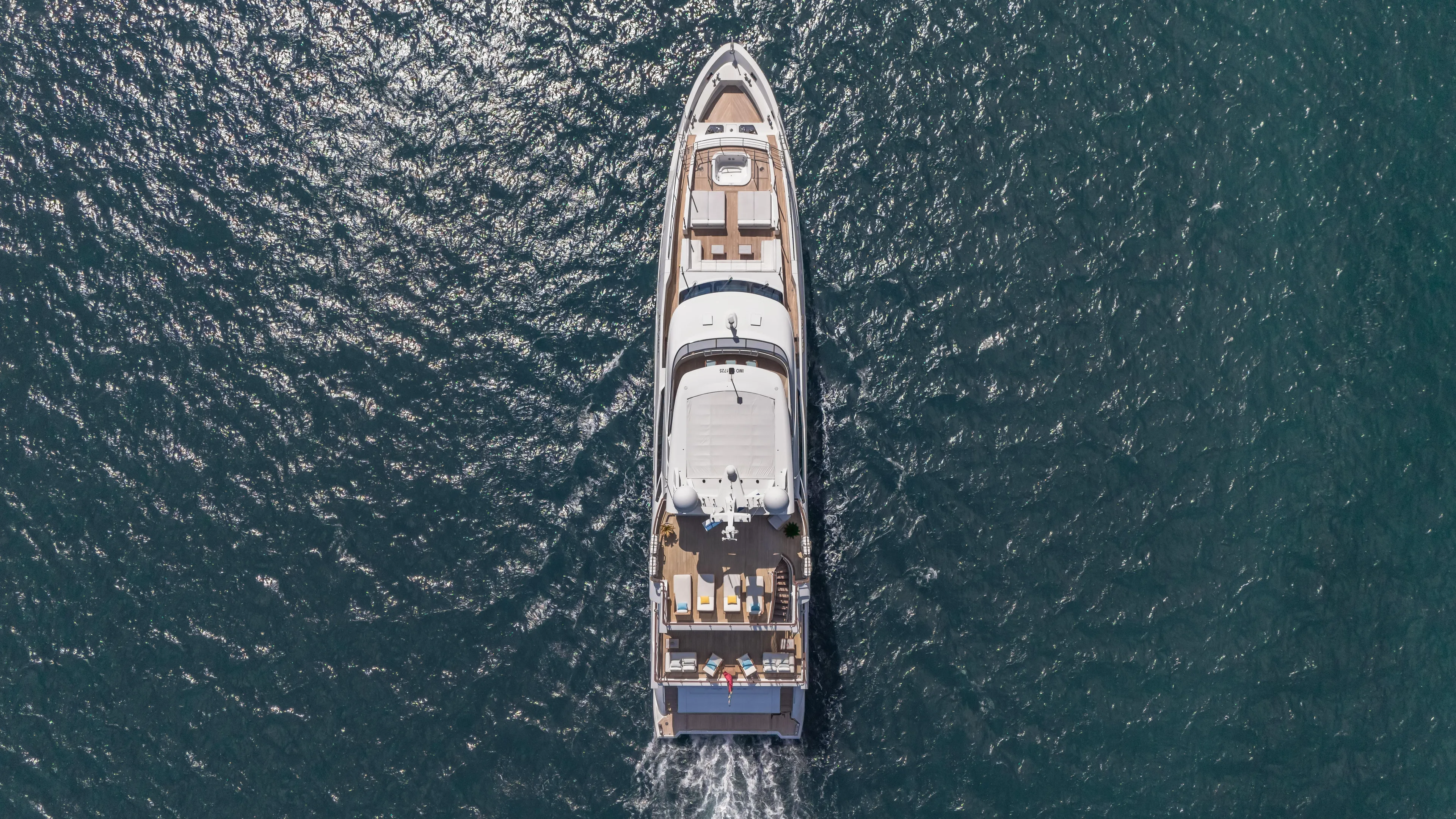 Inspiration Yacht Photos Pics Aerial view of 2018 Benetti Fast 125 yacht cruising on open water.