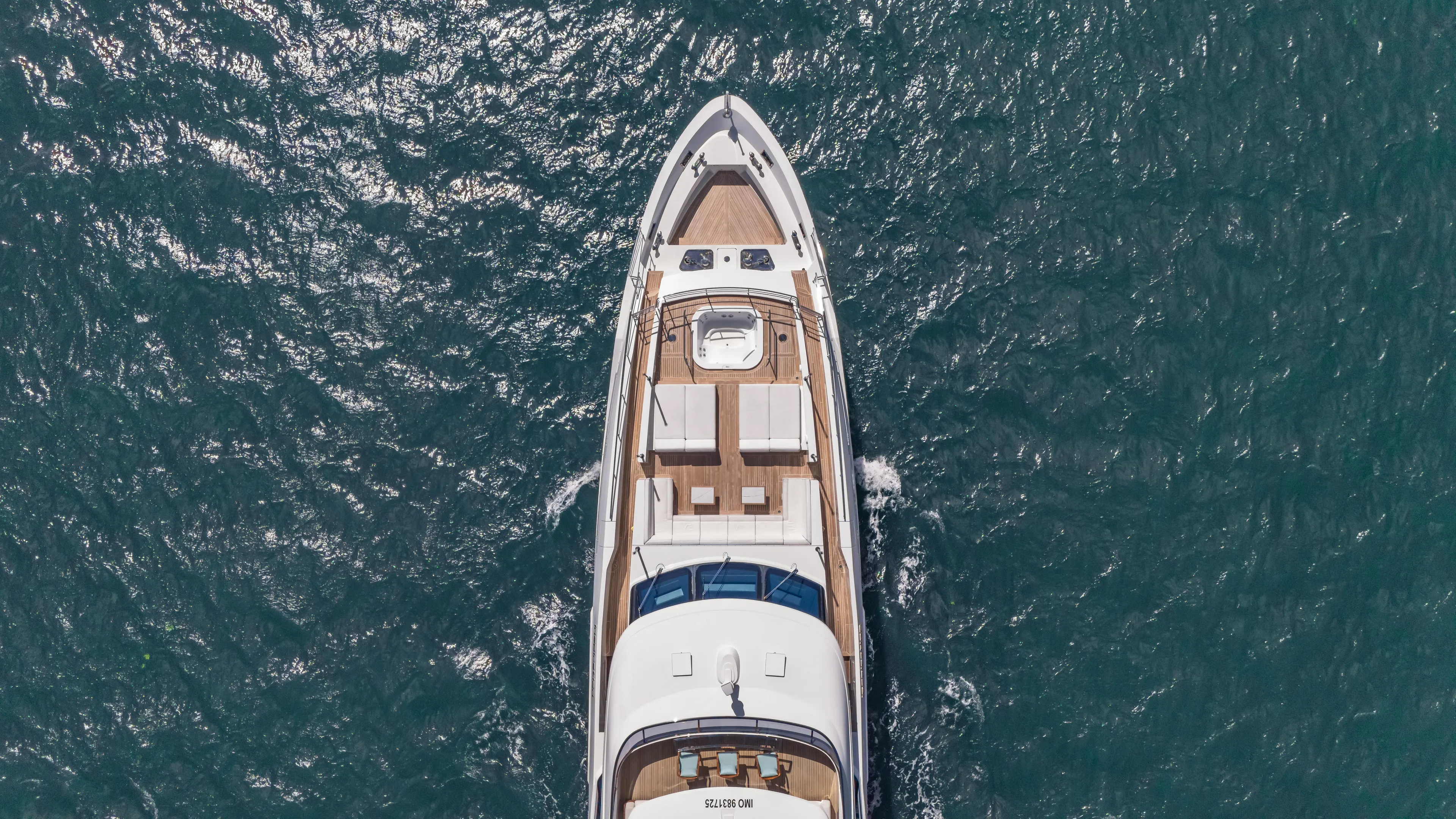 Inspiration Yacht Photos Pics Aerial view of 2018 Benetti Fast 125 yacht cruising on open water.