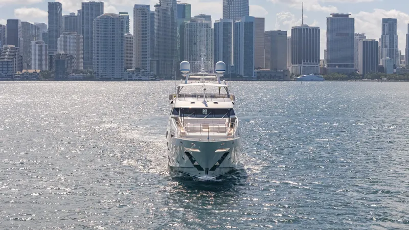 Inspiration Yacht Photos Pics 2018 Benetti Fast 125 yacht cruising with city skyline backdrop.