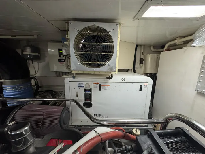 G-one Yacht Photos Pics Engine room of 2009 Azimut 82 yacht with Kohler generator and ventilation system.