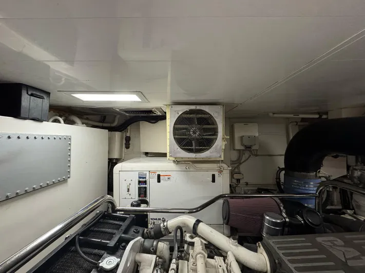 G-one Yacht Photos Pics Engine room of a 2009 Azimut 82 yacht, featuring machinery and ventilation systems.