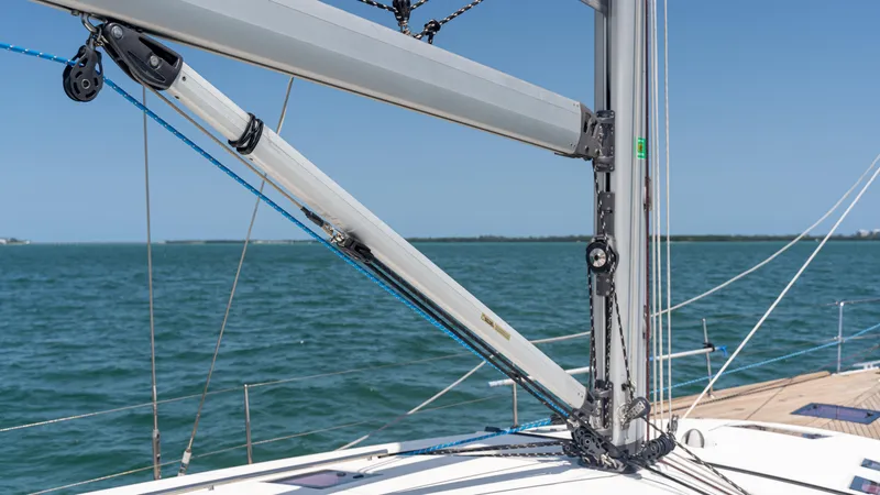 Indigo Dream Yacht Photos Pics 2012 Beneteau Sense 50 sailboat mast and rigging against ocean backdrop.