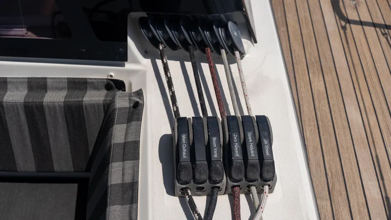 Indigo Dream Yacht Photos Pics Control lines on a 2012 Beneteau Sense 50 yacht deck, featuring labeled clutches.