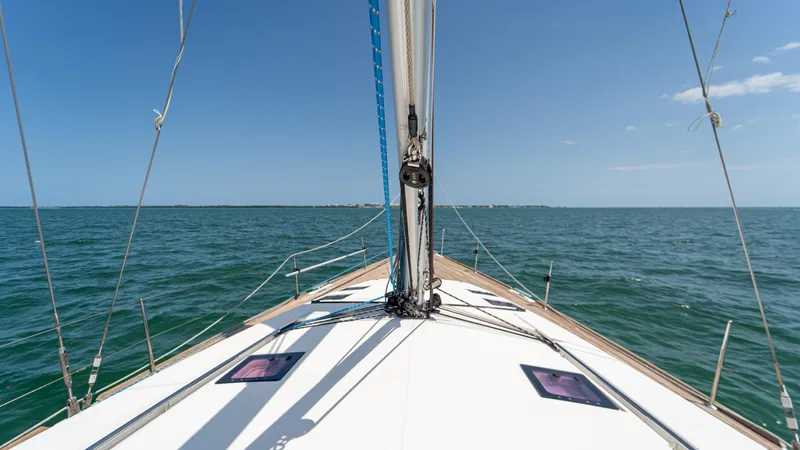 Indigo Dream Yacht Photos Pics Sailing on a 2012 Beneteau Sense 50 yacht, open sea view, clear blue sky.