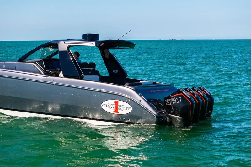  Yacht Photos Pics 2020 Cigarette 42' Auroris boat with multiple engines on open water.