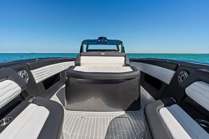  Yacht Photos Pics 2020 Cigarette 42' Auroris luxury boat interior with sleek seating and ocean view.