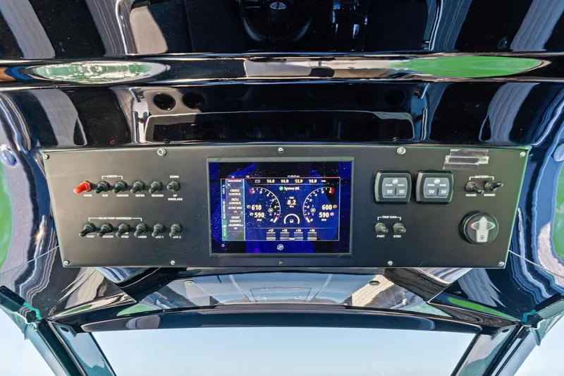  Yacht Photos Pics Control panel of 2020 Cigarette 42' Auroris boat with digital display and switches.