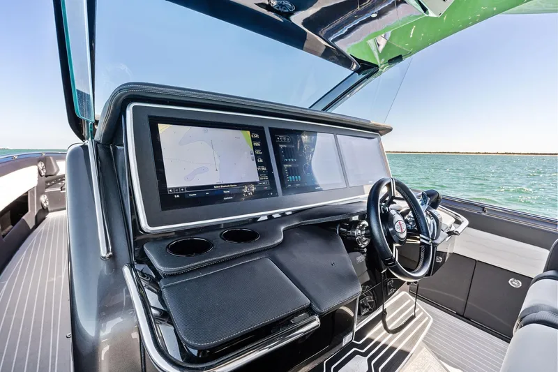  Yacht Photos Pics Helm of 2020 Cigarette 42' Auroris boat with advanced navigation system.