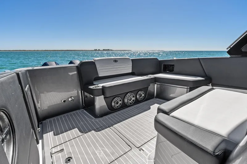  Yacht Photos Pics 2020 Cigarette 42' Auroris boat interior with sleek seating and ocean view.