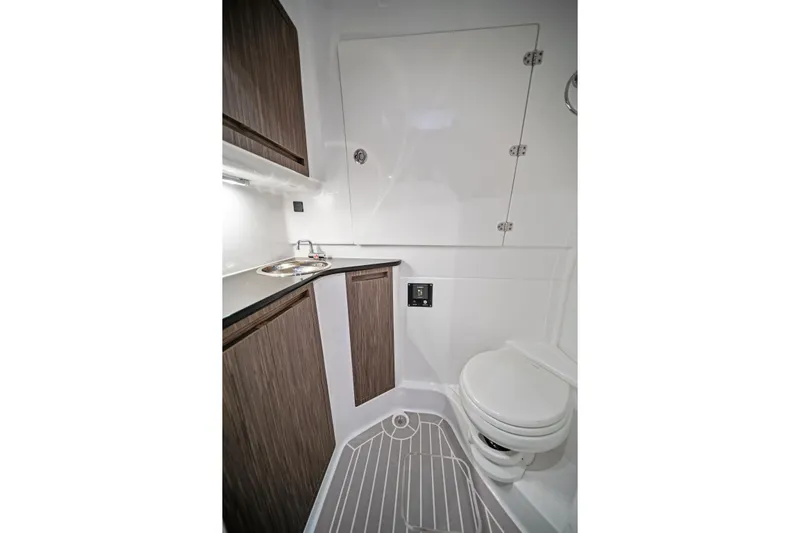  Yacht Photos Pics 2020 Cigarette 42' Auroris boat bathroom with modern sink and toilet design.
