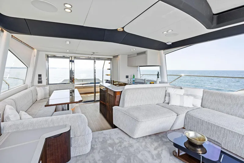  Yacht Photos Pics Luxurious interior of 2024 Fairline Phantom 65 yacht with ocean view.