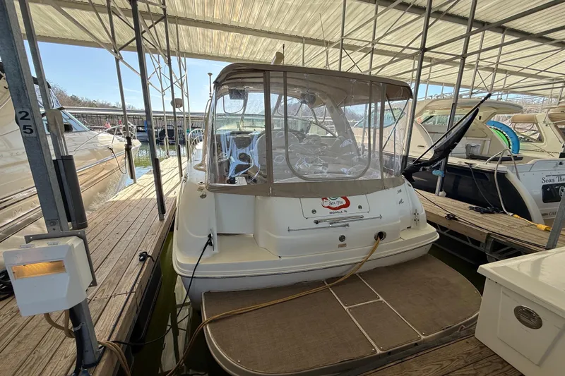 Fox Den Yacht Photos Pics 2001 Sea Ray 380 Sundancer docked in a covered marina slip.